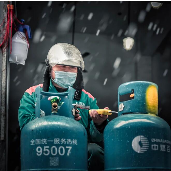 「保供有我」中燃百江:迎风雪 保冬供